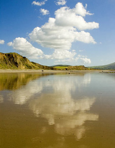 Reflections of the clouds on a wet beach, Dinas Dinlle beach, North Wales UK. Ephotozine Readers Choice Award.