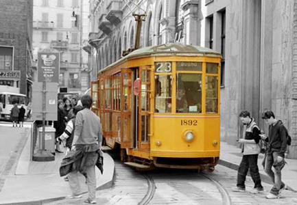 Selective colour photograph of an old Tram as it passes through the city of Milan Italy. winner of an ePHOTOzine readers' choice award
